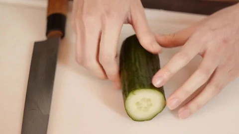 Cucumber cutting Stock Footage 89662764