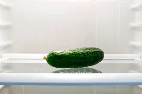 The cucumber in the fridge Stock Photos