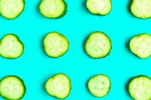 Cucumber pattern on bright blue background. Minimal concept. Stock Photos