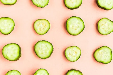 Cucumber pattern on pastel pink background. Minimal concept 스톡 사진