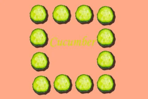 Cucumber pattern on pink background, minimal concept, copy space for the text Stockfoto's