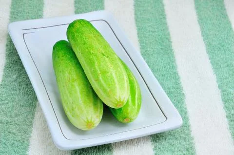 Cucumber on plate Stock Photos