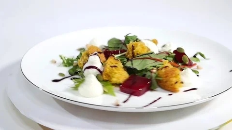 Cucumber salad with grilled tuna. Arugula and Beet Salad with Goat Cheese and Stock Footage