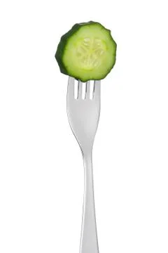 Cucumber slice on a fork isolated Stock Photos