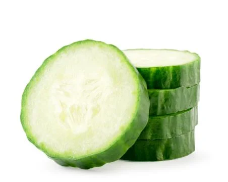 Cucumber sliced close-up on a white background. Stock Photos