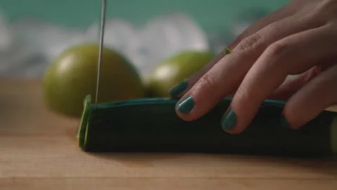 Cucumber sliced on cutting board Stock Footage 274709365