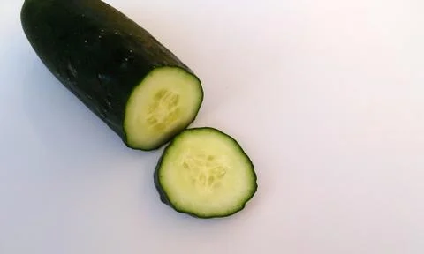 Cucumber sliced on white background Stock Photos