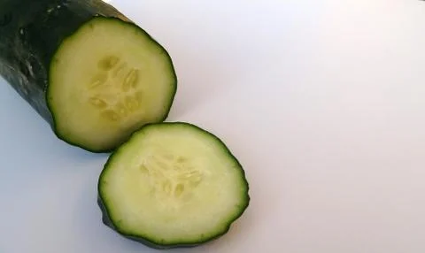 Cucumber sliced on white background Stock Photos