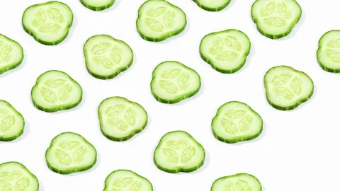 Cucumber slices pattern isolated on white background 스톡 동영상 135342986