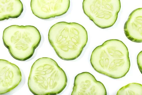 Cucumber slices pattern isolated on white background 写真素材