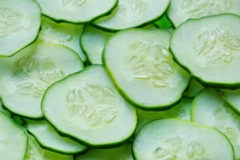 Cucumber slices texture background Stock-Fotos