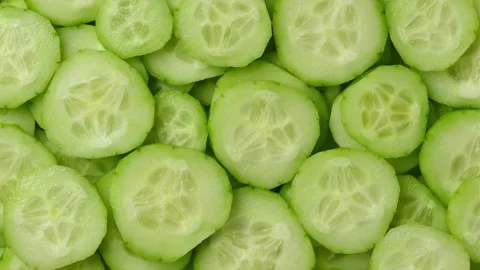 Cucumber slices top view, rotation Video stock 254663264