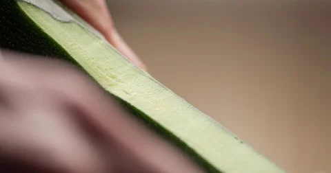 Cucumber slicing slowmotion Stock Footage 72535386