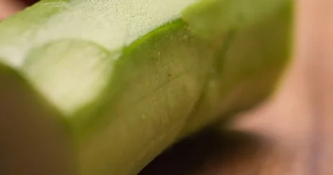 Cucumber slicing slowmotion Stock Footage 72537722
