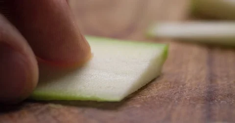 Cucumber slicing slowmotion Stock Footage 72563617