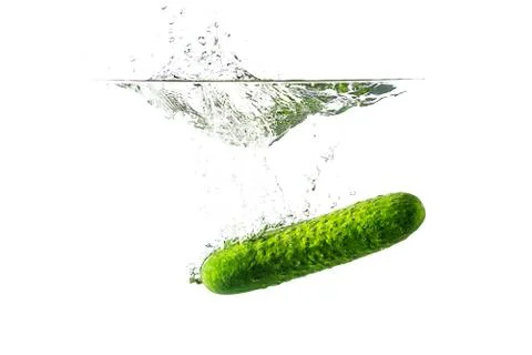 Cucumber with spray isolated on white. Stock-Fotos
