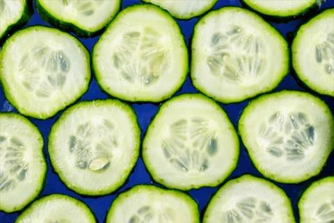 Cucumber-vegetable background. Cucumbers in cooking, add to salads, soups, Stock Photos