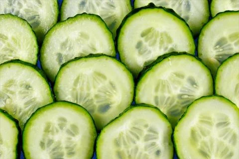 Cucumber-vegetable background. Cucumbers in cooking, add to salads, soups, Stock Photos