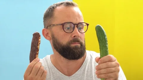 Cucumber vs cake Stock Footage 110628824