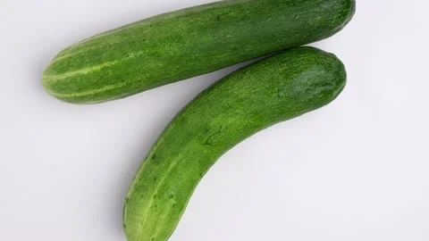Cucumber on white background rotated. Stock Footage 247299135