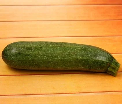 Cucumber on wood table top Stock Photos