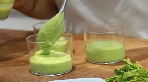 Cucumber yogurt cold soup plating and serving Cucumber Soup with Yogurt Recipe Stock Footage 68780645