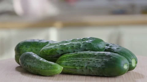 CucumberIs On the Table In Kitchen In House Stock Footage 157994270