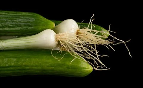 Cucumbers and onion Stock Photos