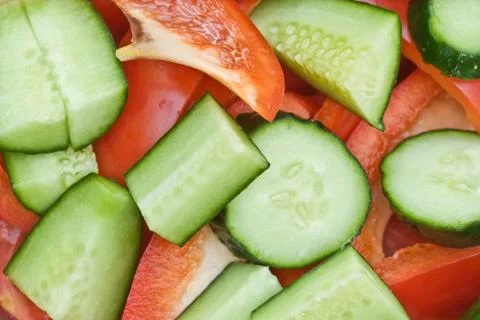 Cucumbers and peppers Stock Photos