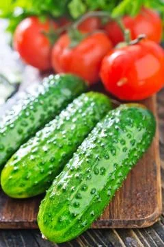 Cucumbers and tomato Stock Photos