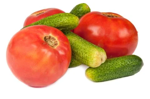 Cucumbers and tomatoes Stock Photos