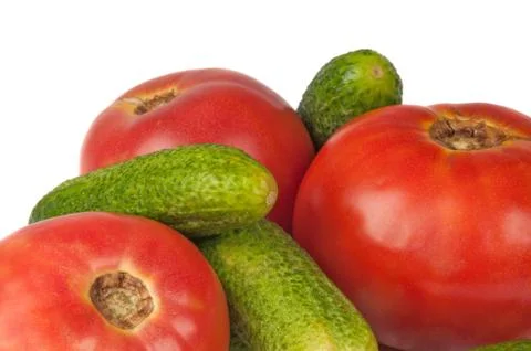 Cucumbers and tomatoes Stock Photos
