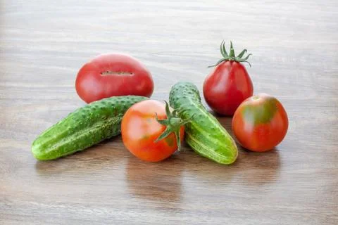 Cucumbers and tomatoes Stock Photos