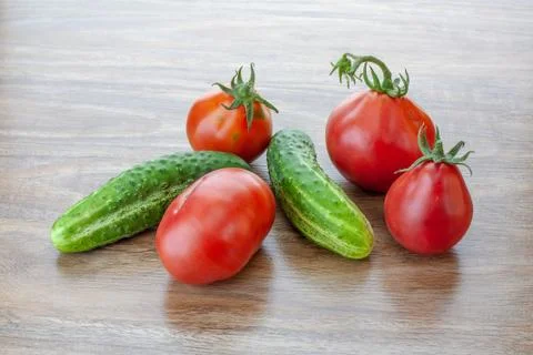 Cucumbers and tomatoes Stock Photos