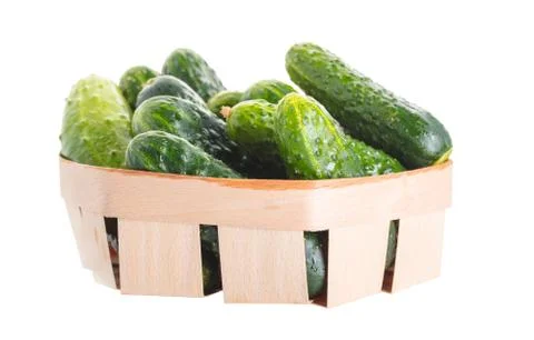 Cucumbers in a basket Stock Photos