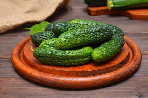 Cucumbers close-up on the kitchen table Stock Photos