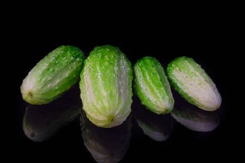 Cucumbers isolated on black background Stock Photos
