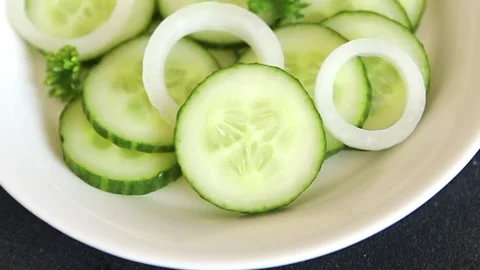 Cucumbers salad fresh vegetable dish delicious appetizer fresh and delicious Stock Footage 342561955