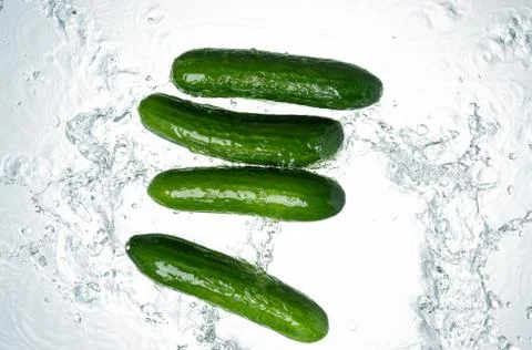Cucumbers Water Splash Stock Photos