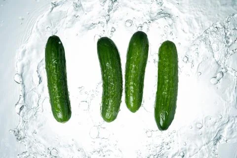Cucumbers Water Splash Stock Photos