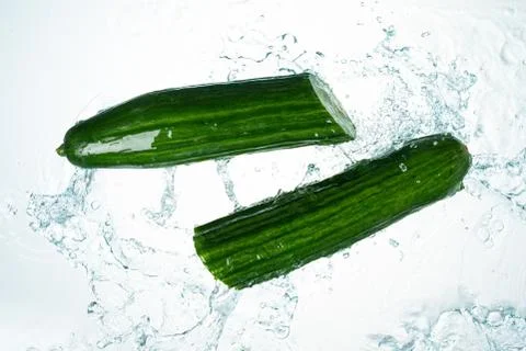 Cucumbers Water Splash Stock Photos