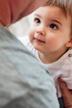 Cuddles with Dad Stockfoto's