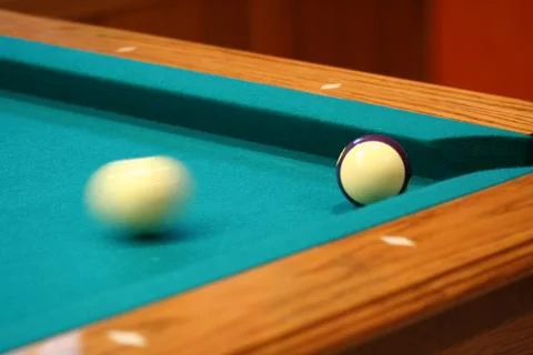 Cue ball in motion Stock Photos
