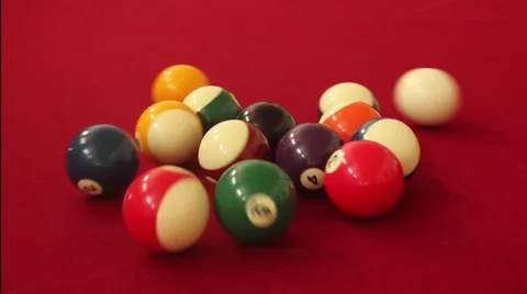 Cue Ball Strikes Pool Balls on Pool Table Rear View CU Stock Footage 41193144