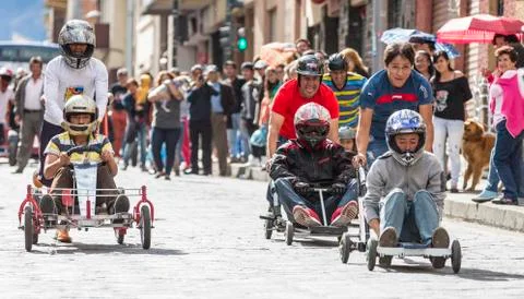 Cuenca, Ecuador - April 12, 2015 - Teenage boys race their home-built soap box Stock-Fotos