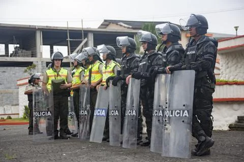 Cuenca, Ecuador - August 13, 2015 - Riot police stand in formation Stock Photos