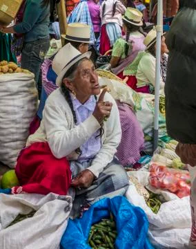 Cuenca, Ecuador - Dec 30, 2012: Woman lectures customer Stock Photos