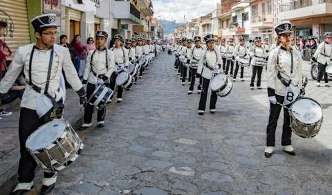 Cuenca, Ecuador, Jan 13, 2018: Drummers marching in parade Stock Photos