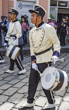 Cuenca, Ecuador, Jan 13, 2018: Drummers marching in parade Stock Photos