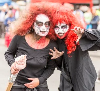 Cuenca, Ecuador - Jan 5, 2014: Two girls are dressed as ghouls Stock Photos